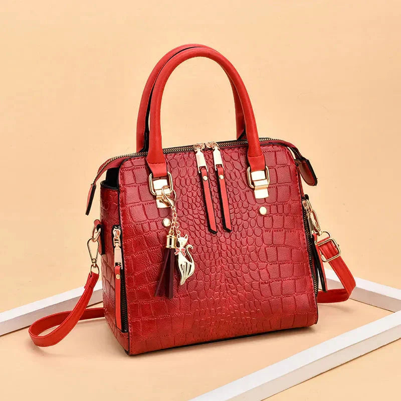 GLOW™ | Bolso con textura de cocodrilo