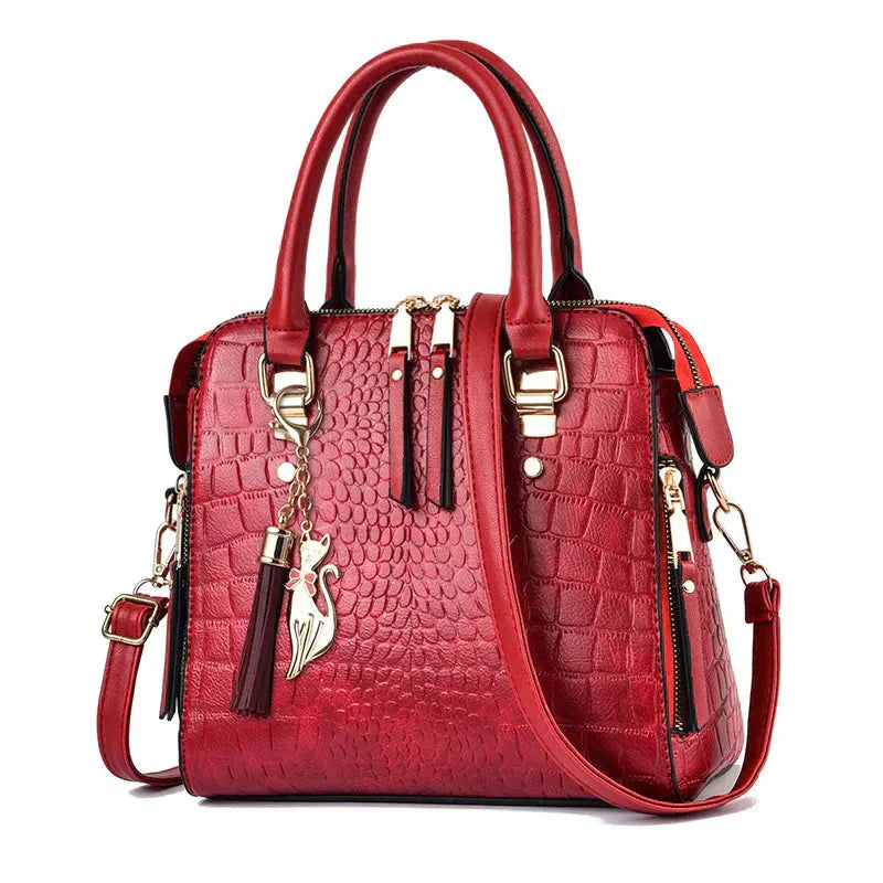 GLOW™ | Bolso con textura de cocodrilo