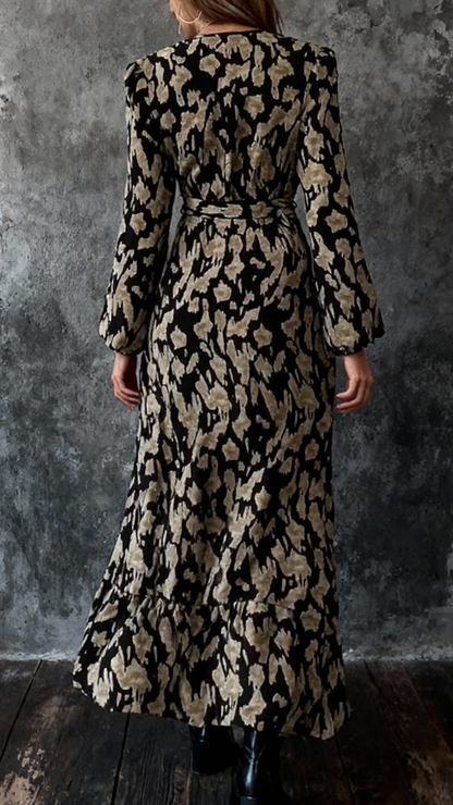 FLORA | Vestido largo estampado con mangas de farol, bajo con volantes y cinturón